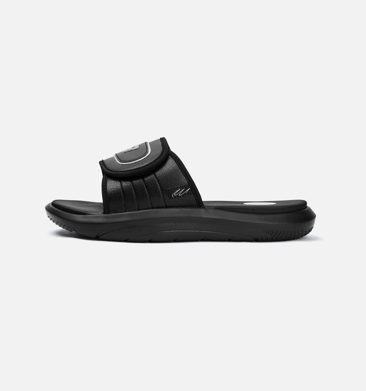 Black slide sandal with an adjustable strap, ST logo, and red S-FOAM footbed. Main image